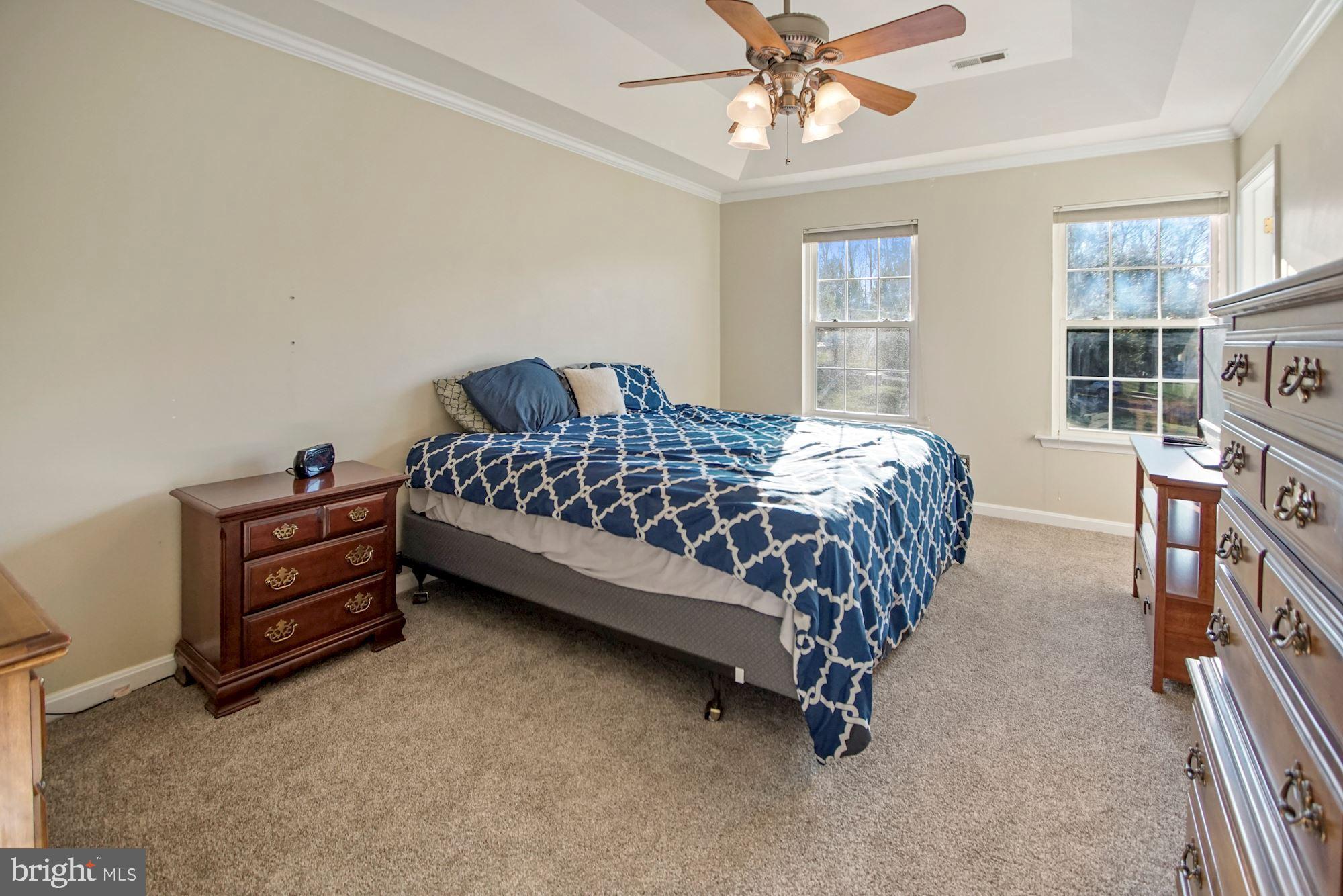 1731 Lottie Fowler Road Prince Frederick, MD 20678 - Photo 21 of 41 Primary Bedroom with walk-in closet and en suite