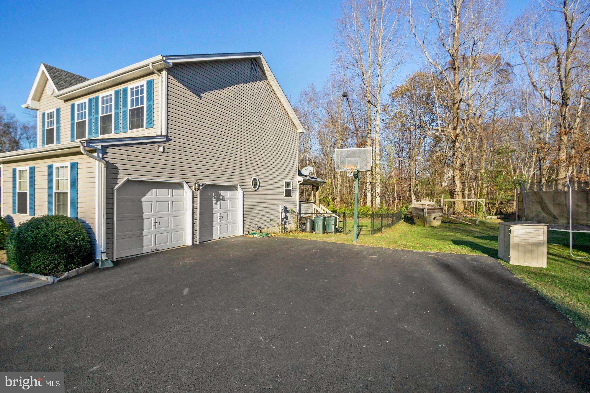 1731 Lottie Fowler Road Prince Frederick, MD 20678 - Photo 5 of 41 2 car garage with garage door opener