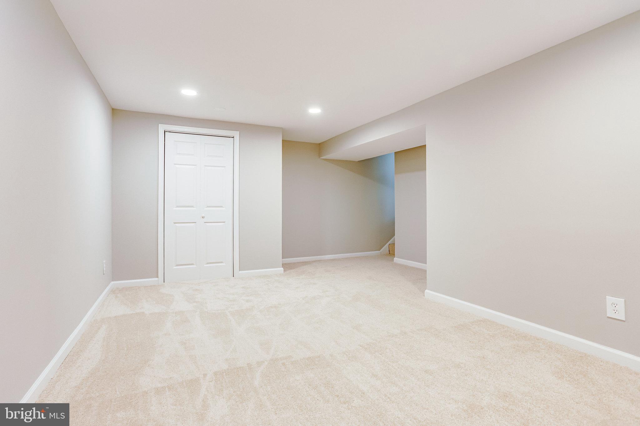 11863 Abercorn Court Reston, VA 20191 - Photo 13 of 75 Lower level family room with new plush carpeting