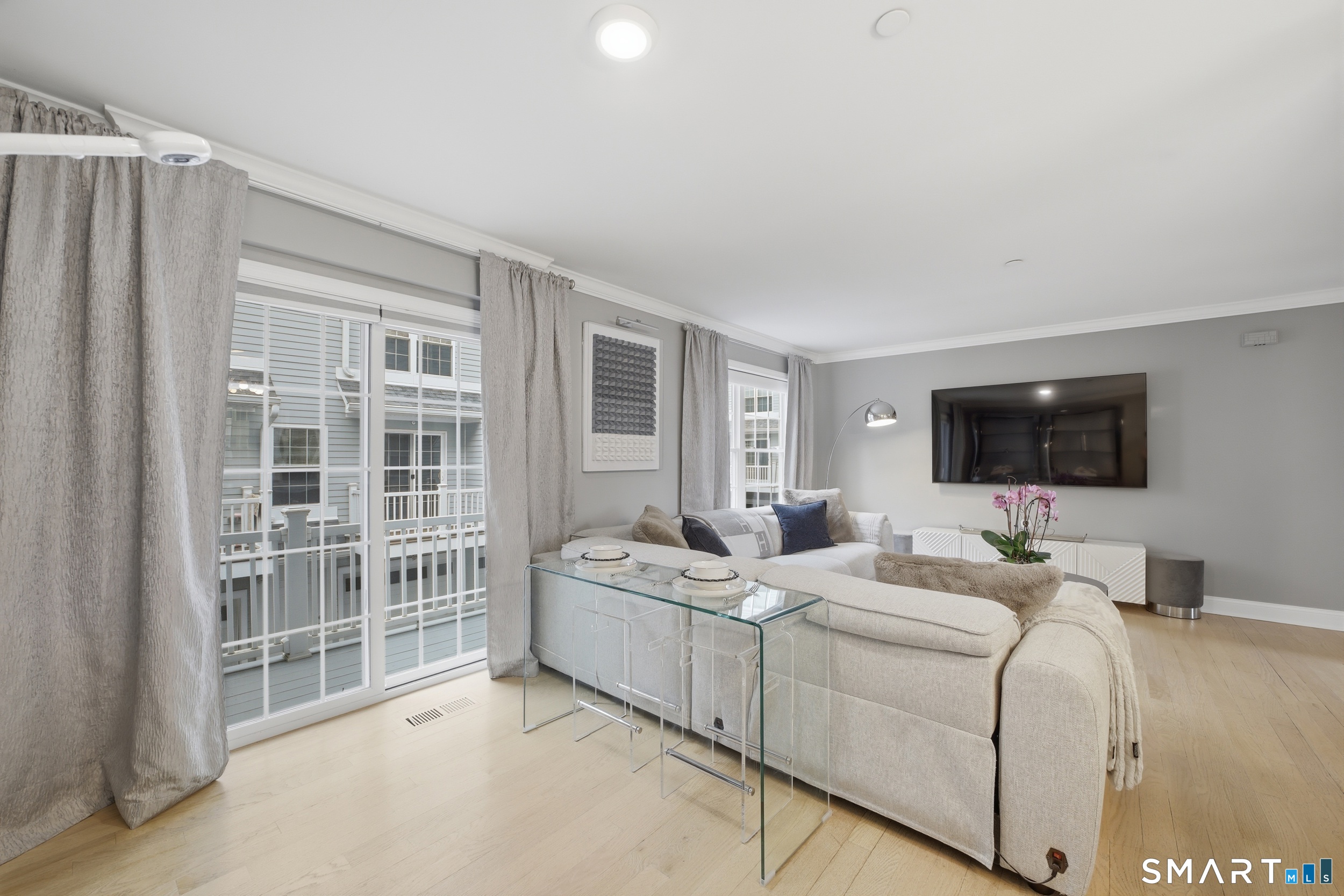 20 3rd Street, Unit 3 Stamford, CT 06905 - Photo 12 of 43 Main Level living room connecting to balcony