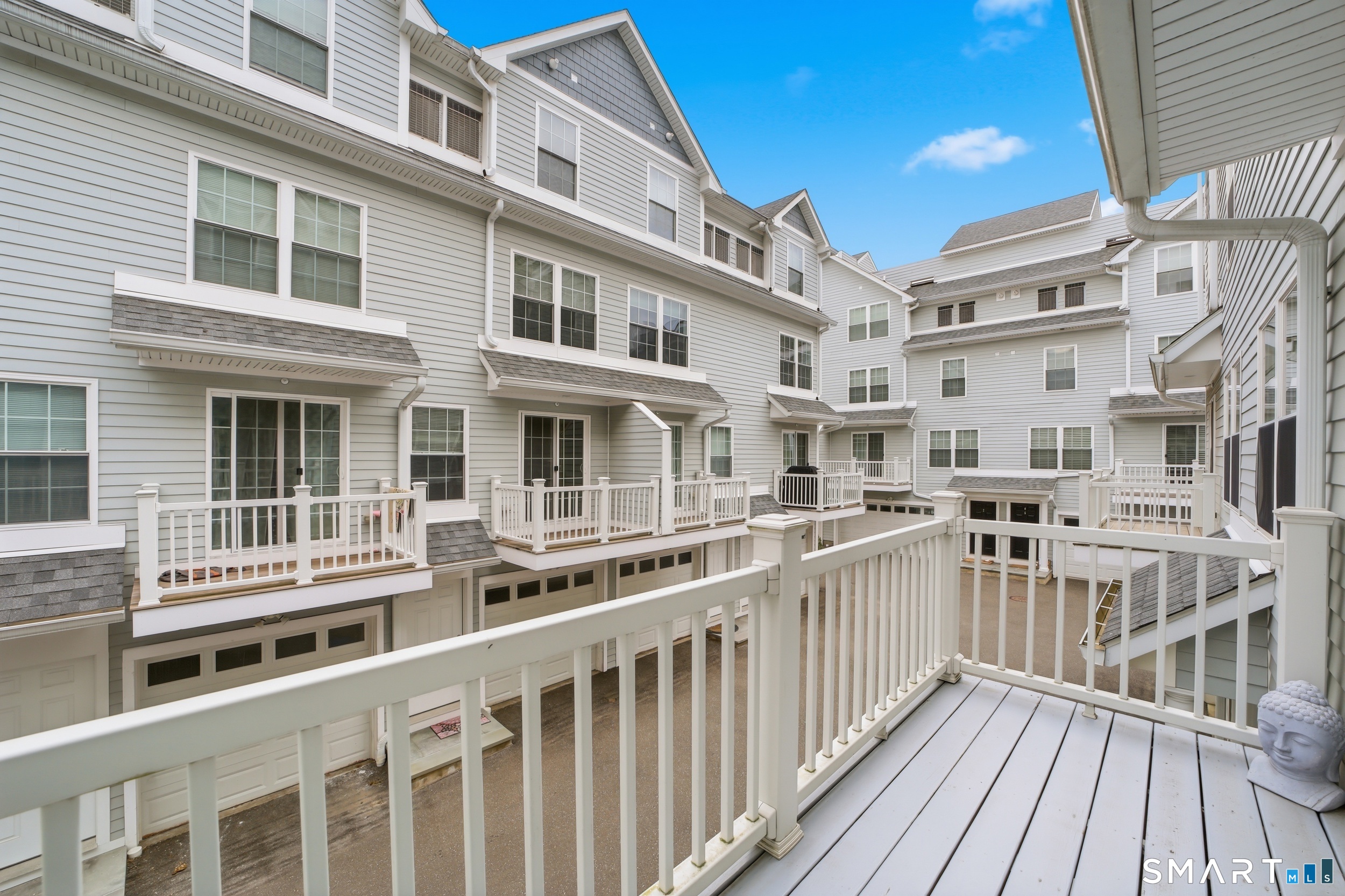 20 3rd Street, Unit 3 Stamford, CT 06905 - Photo 32 of 43 Balcony connecting to main level living room / dining room
