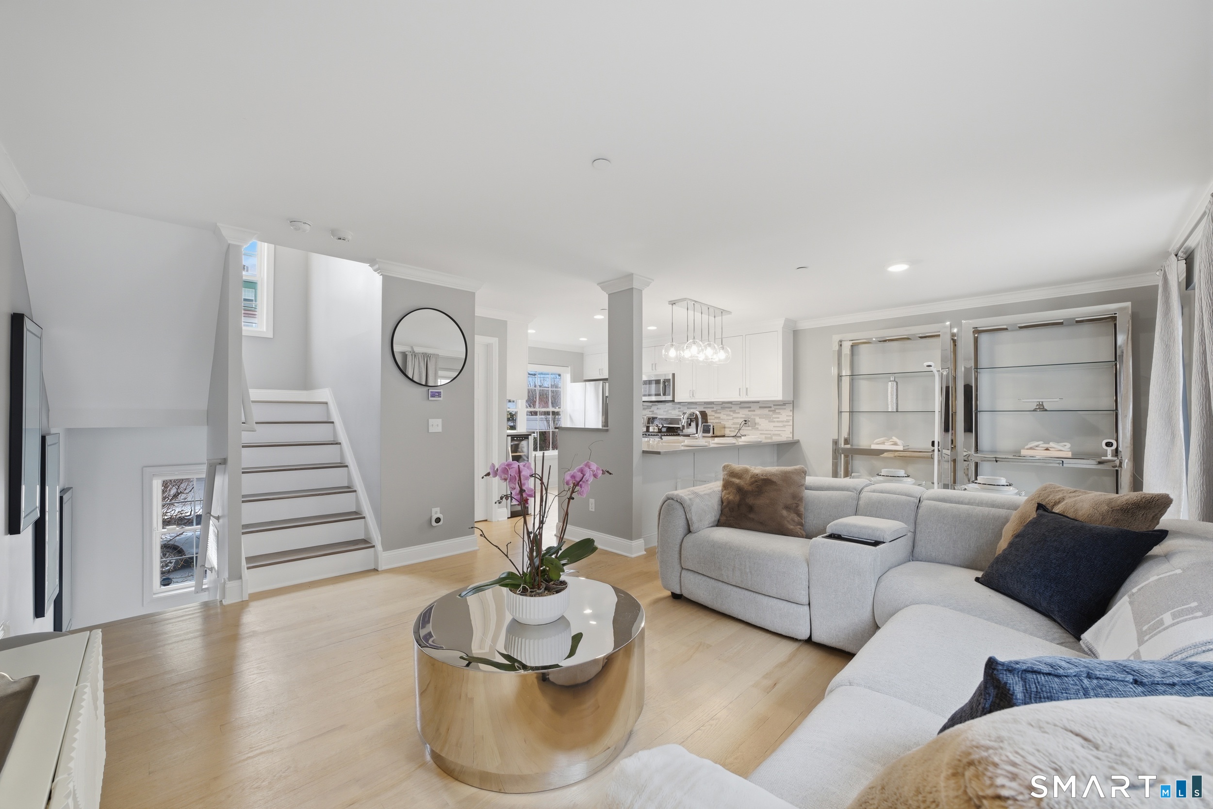 20 3rd Street, Unit 3 Stamford, CT 06905 - Photo 4 of 43 Main level open-concept layout with connected living, dining, and kitchen areas