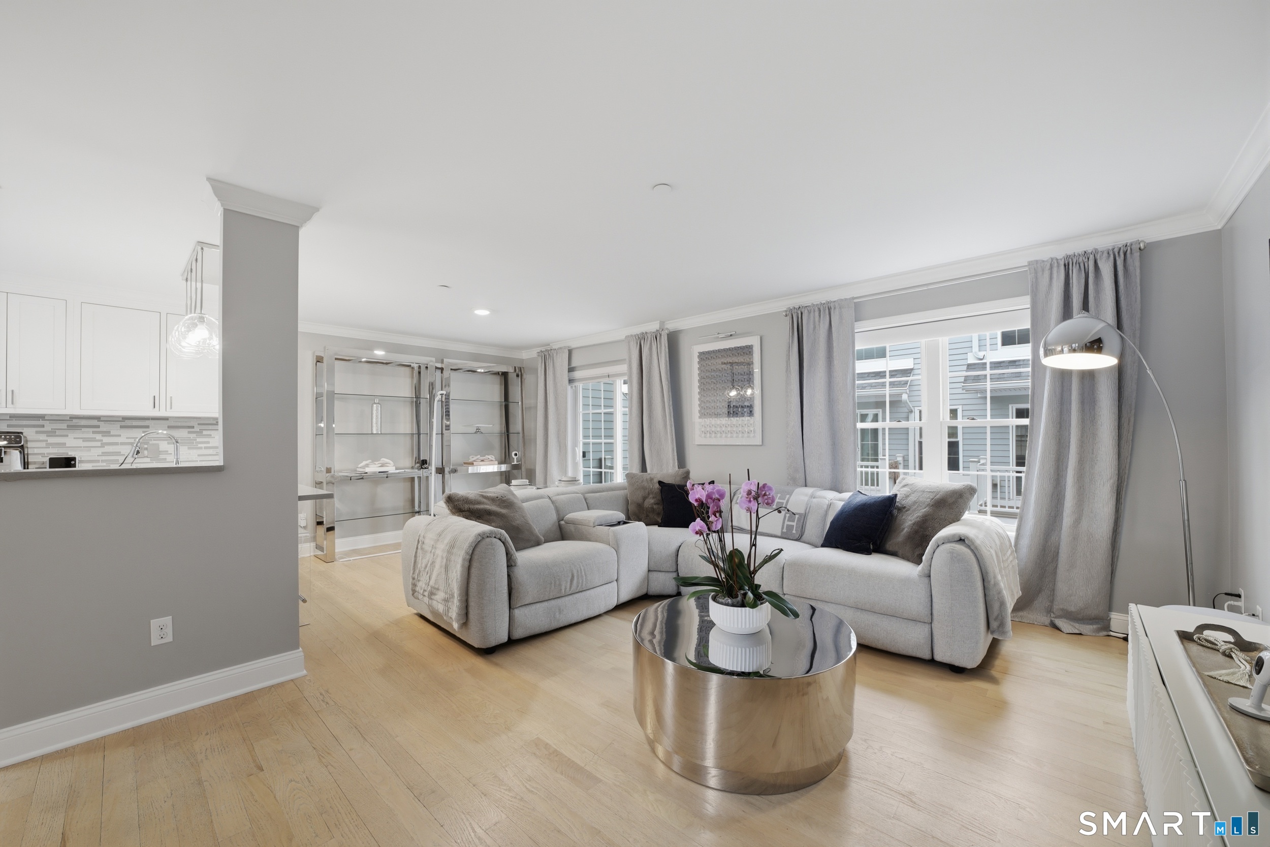 20 3rd Street, Unit 3 Stamford, CT 06905 - Photo 5 of 43 Main level open-concept layout with connected living, dining, and kitchen areas