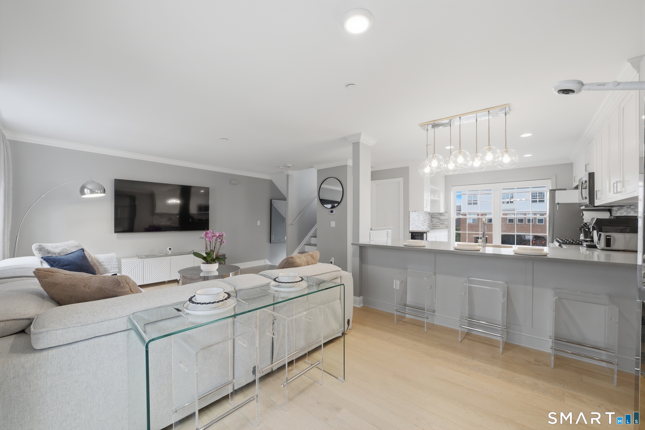 20 3rd Street, Unit 3 Stamford, CT 06905 - Photo 6 of 43 Main level open-concept layout with connected living, dining, and kitchen areas