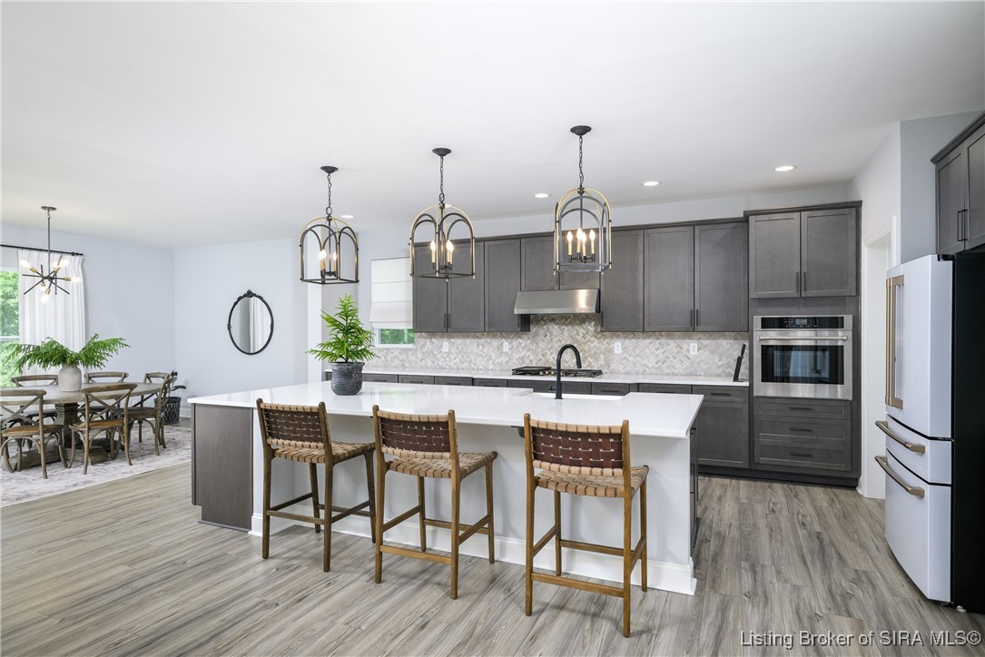 9430 Cooks Mill Road Georgetown, IN 47122 - Photo 13 of 61 HUGE Island, Quartz Countertop and Bar seating