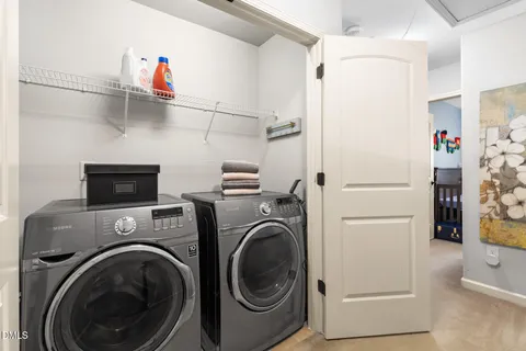 a bathroom with a toilet sink and shower