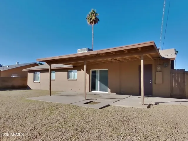 a bathroom with a shower and a toilet