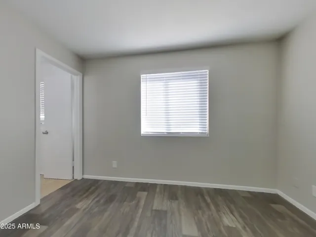 a kitchen with stainless steel appliances granite countertop wooden cabinets a stove top oven a sink and dishwasher