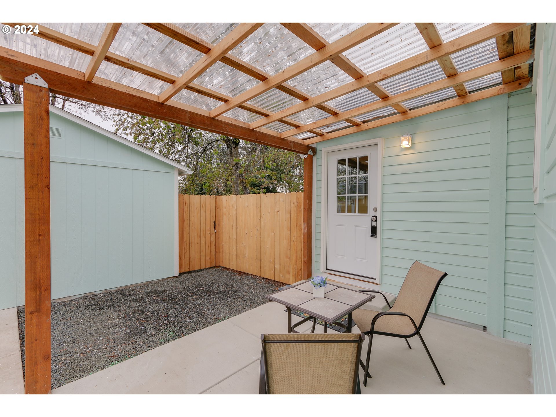 144 South 15th Street Springfield, OR 97477 - Photo 20 of 35 a view of a porch with furniture and a yard