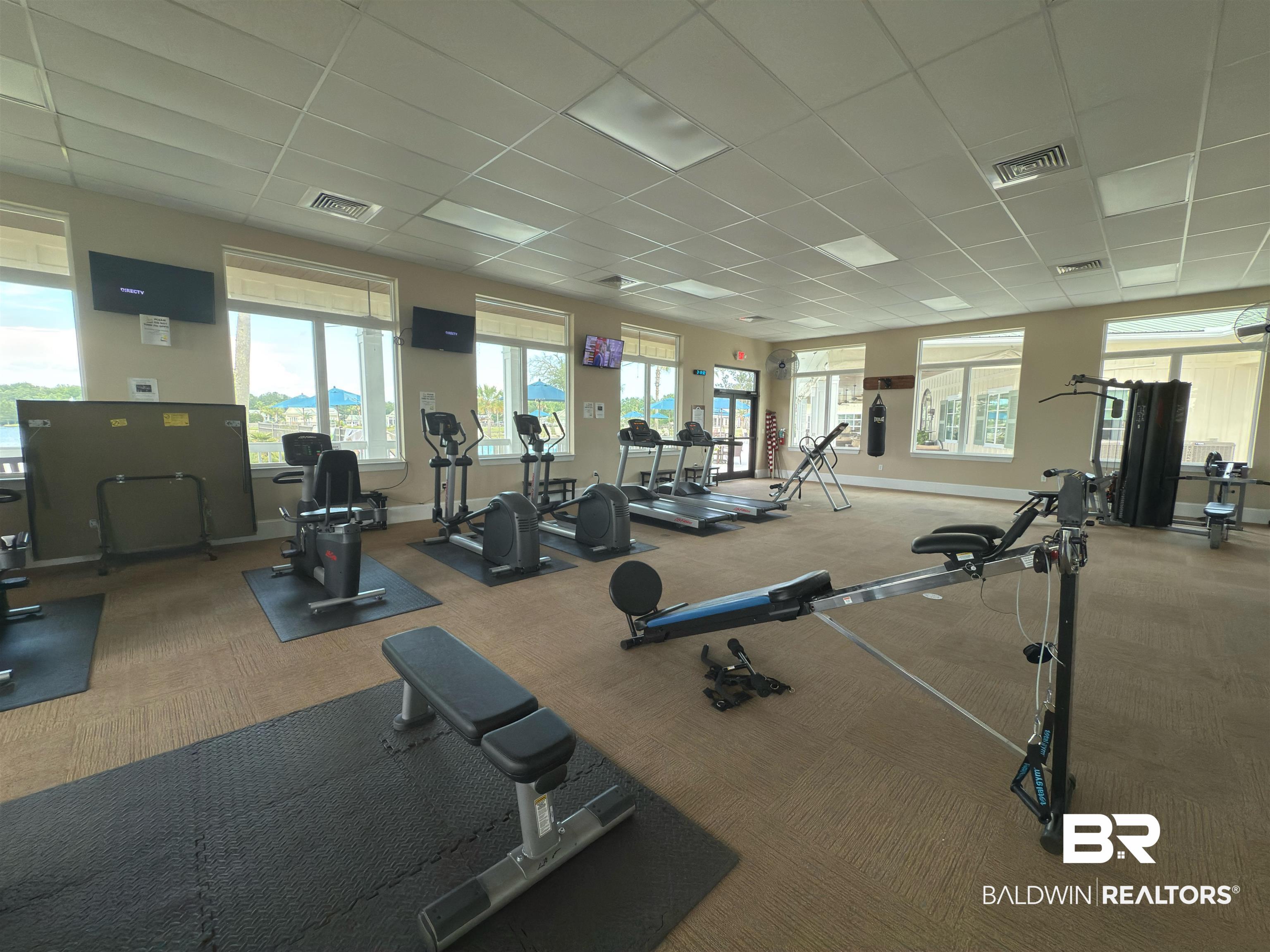 11986 Raptor Court Elberta, AL 36530 - Photo 21 of 28 Workout area with a drop ceiling