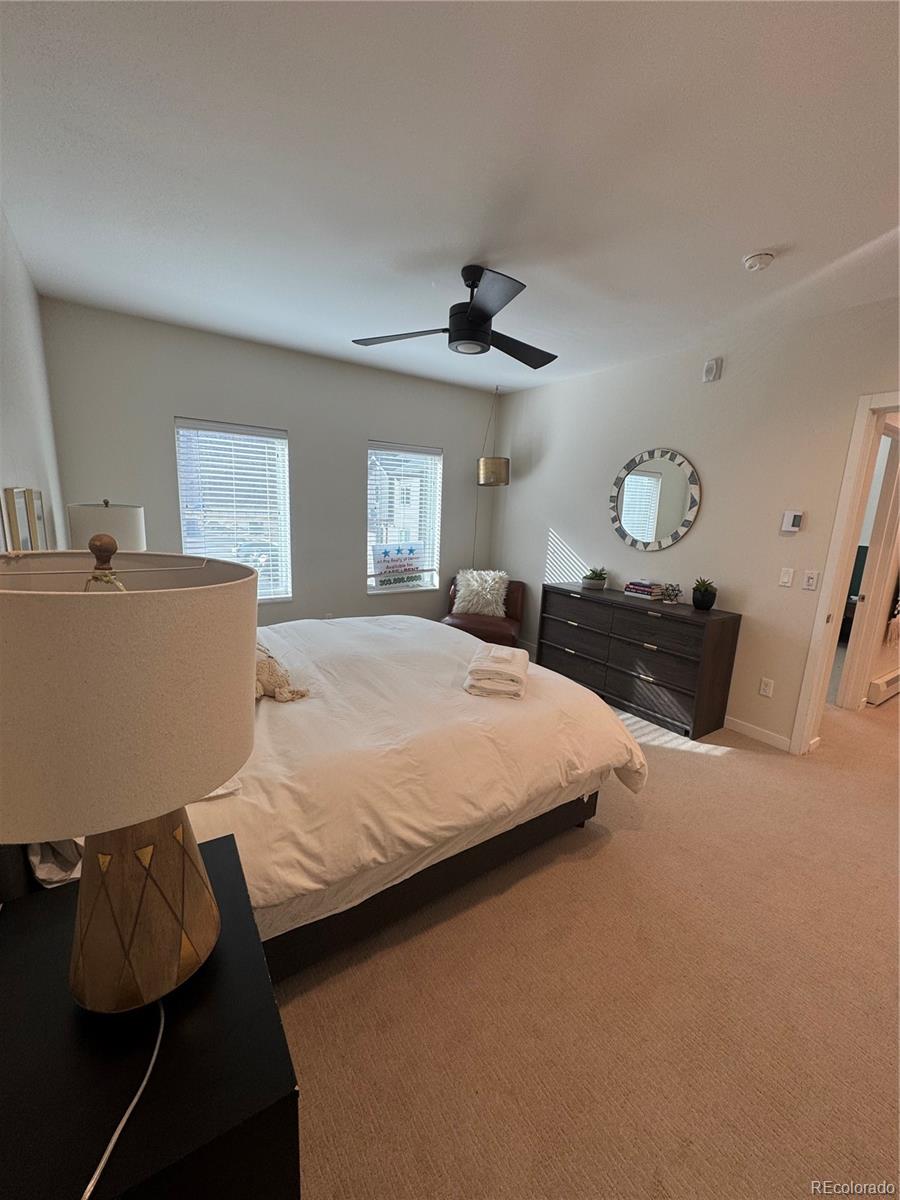 2142 Bighorn Road Georgetown, CO 80444 - Photo 9 of 18 a bedroom with a bed and window