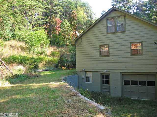 1183 County Home Road Walnut Cove, NC 27052 - Photo 4 of 11 Parking Lot/Garage. Basment Garage