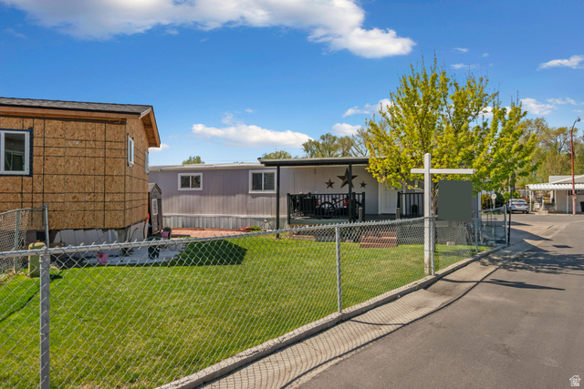 255 North 1600 West, Unit 60 Provo, UT 84601 - Photo 20 of 22 Back of property featuring a patio area