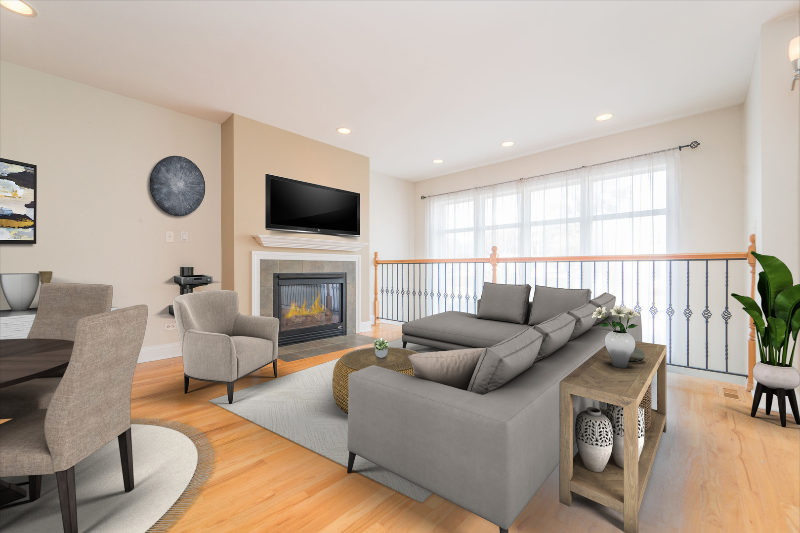 7509 West Irving Park Road, Unit 1 Chicago, IL 60634 - Photo 2 of 28 a living room with furniture a flat screen tv and a fireplace
