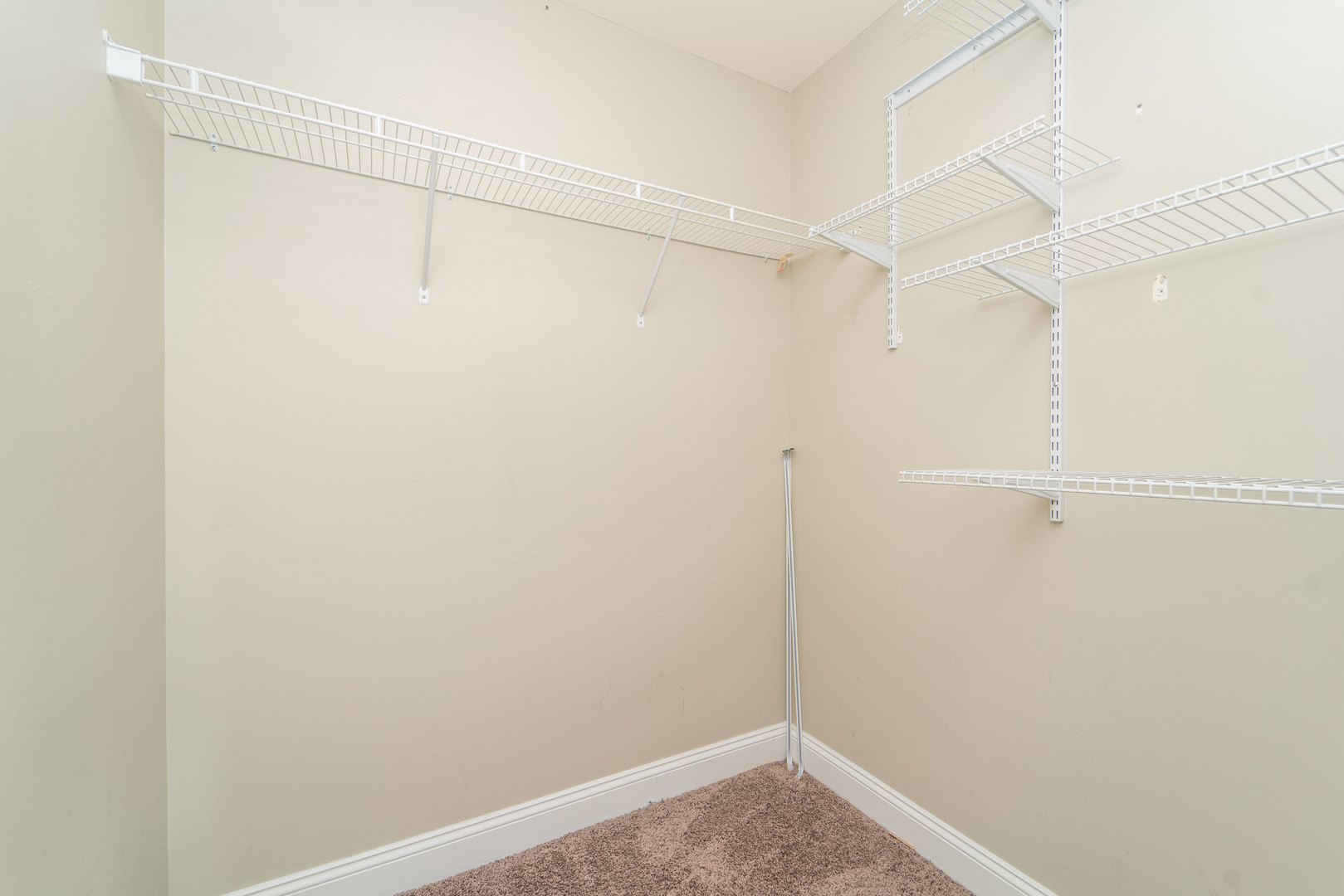 7509 West Irving Park Road, Unit 1 Chicago, IL 60634 - Photo 13 of 28 a view of small space with racks on the wall