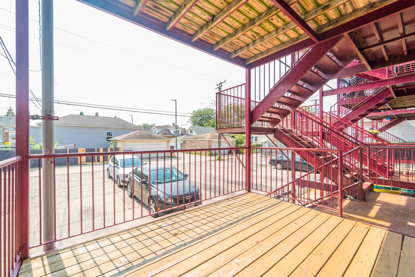 7509 West Irving Park Road, Unit 1 Chicago, IL 60634 - Photo 24 of 28 a view of a balcony with wooden floor