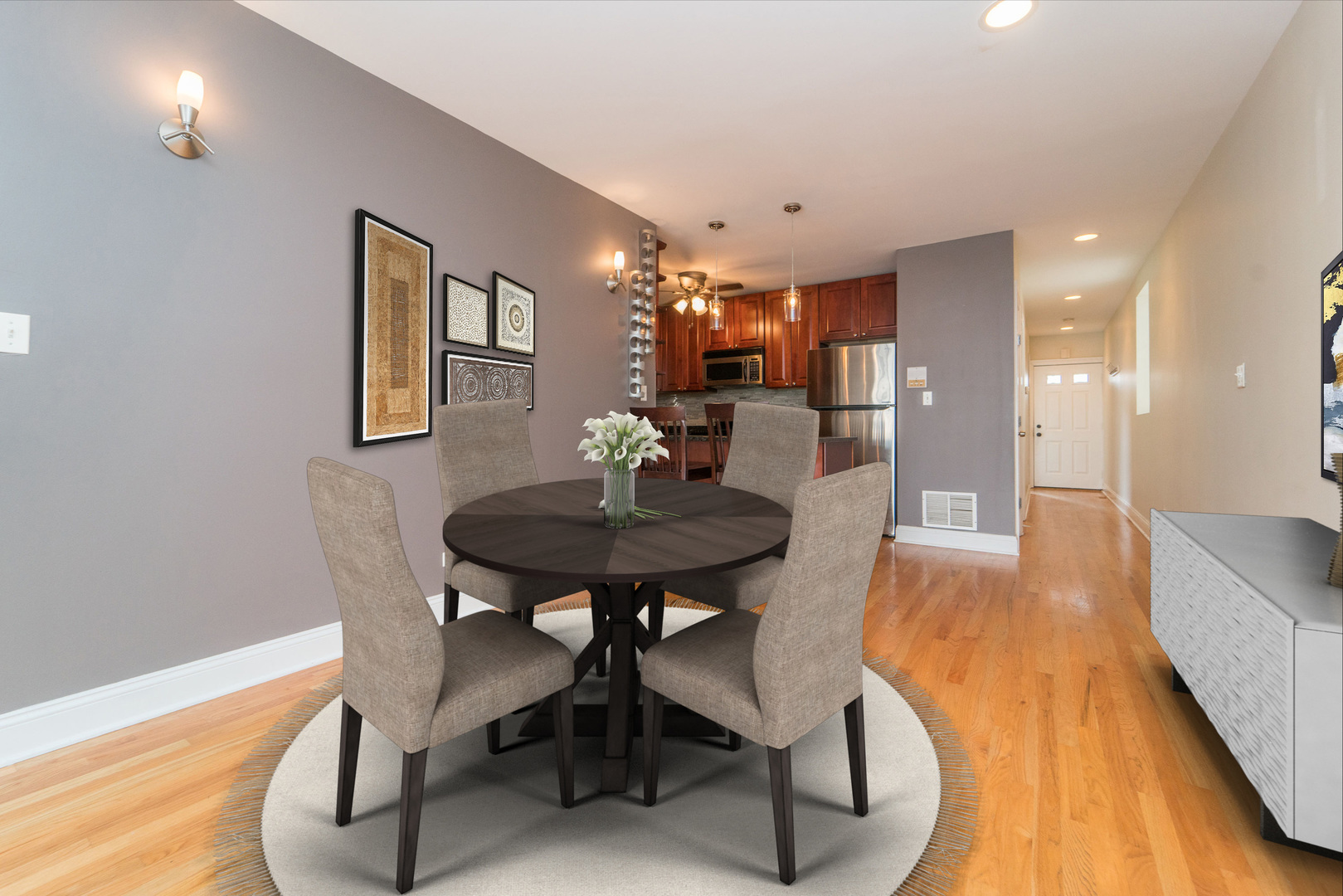 7509 West Irving Park Road, Unit 1 Chicago, IL 60634 - Photo 4 of 28 a view of a dining room with furniture and wooden floor