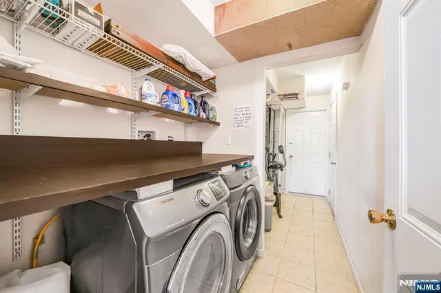 a kitchen with granite countertop a sink and a window