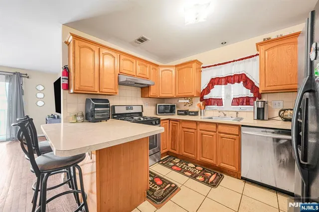 a bathroom with a sink toilet and mirror