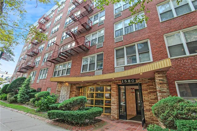 a kitchen with a sink and refrigerator