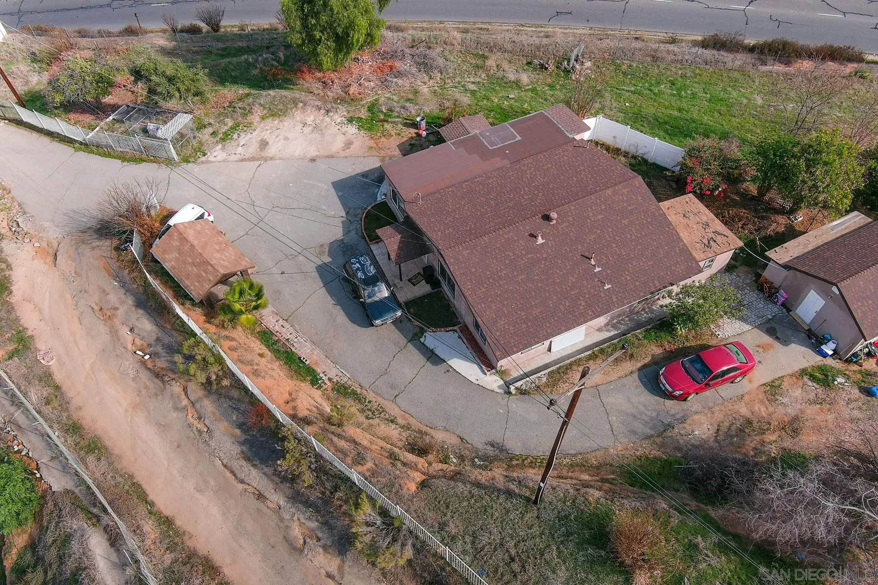 8443 Holsofar Road El Cajon, CA 92021 - Photo 7 of 11 an aerial view of house with a yard