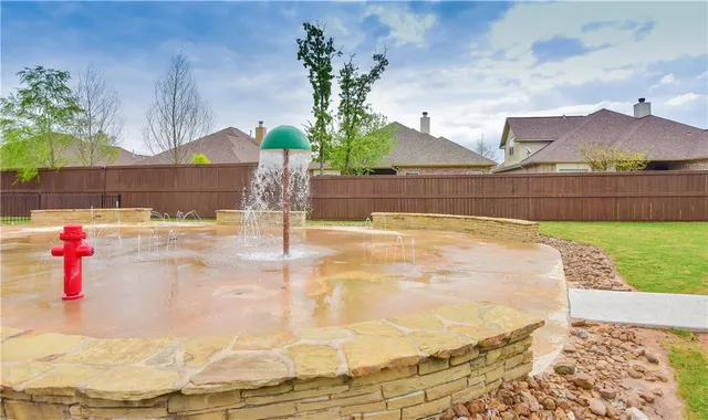 a vase of flowers sitting on a table