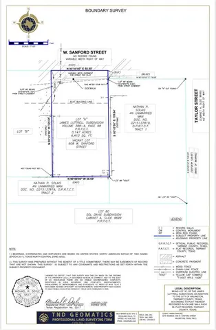 a view of a backyard with a white house