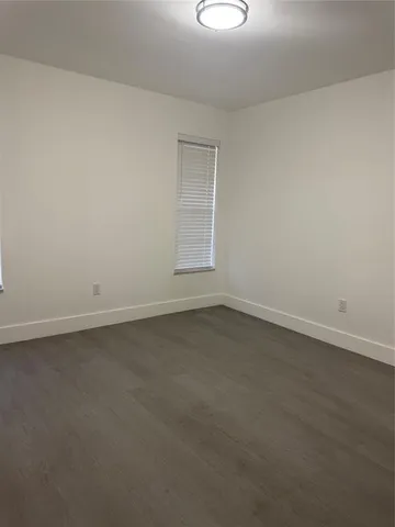 a view of a hallway with closet area