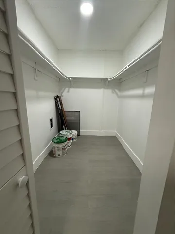 a close view of stove and a microwave oven