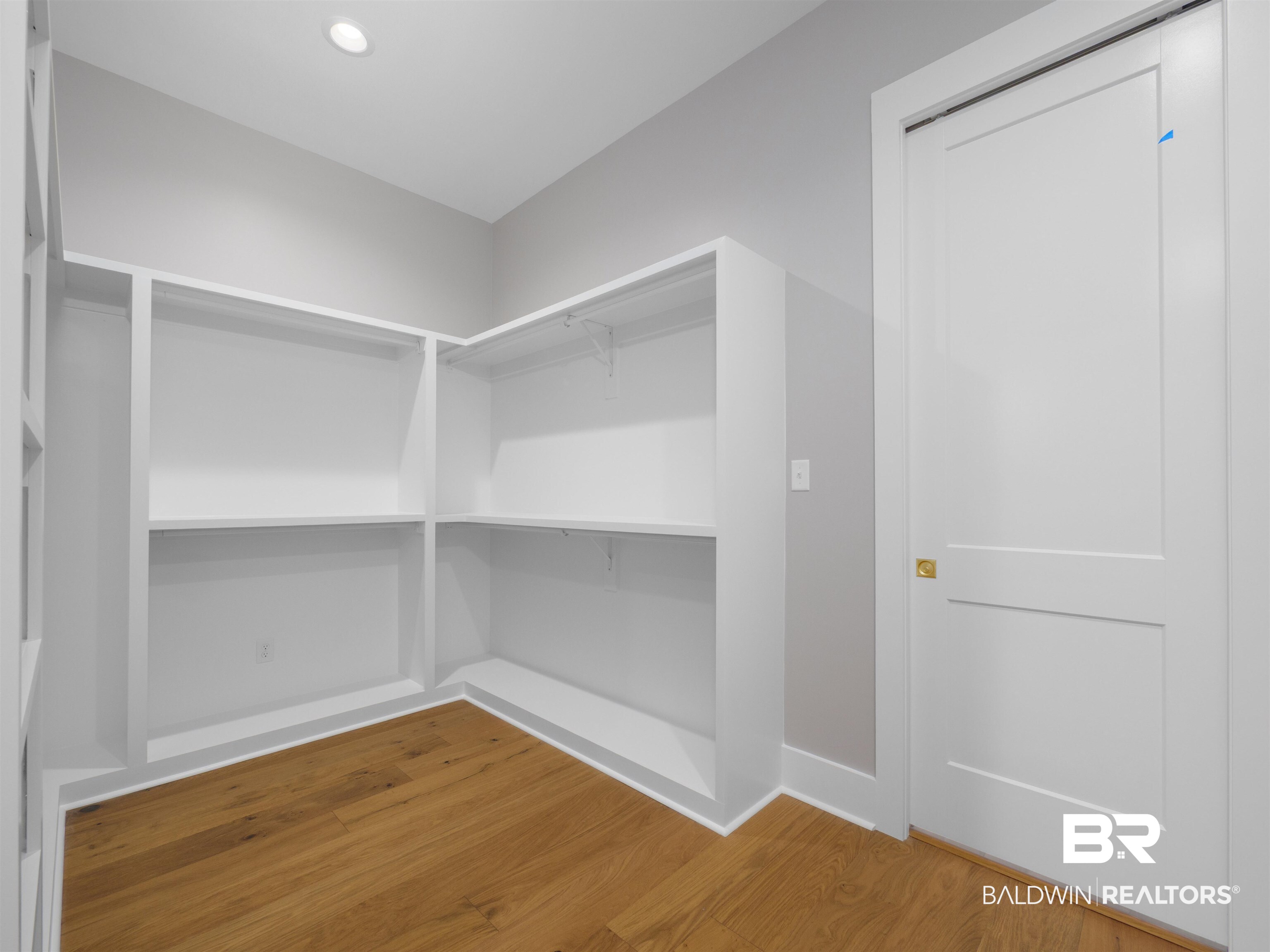 10912 Catania Avenue Fairhope, AL 36532 - Photo 24 of 54 Main closet with two sides and built in cabinets