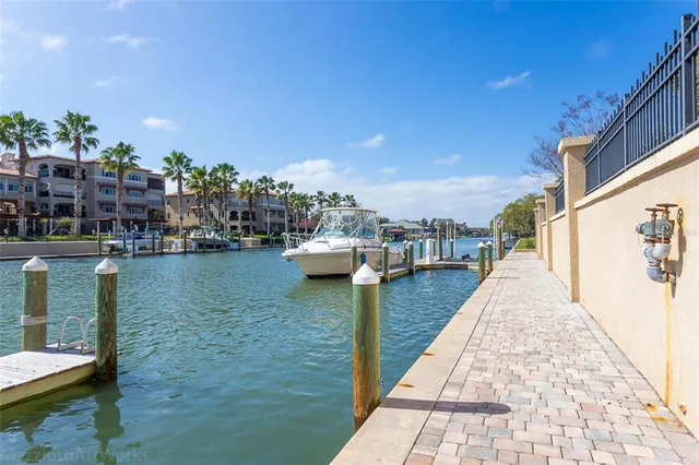 an aerial view of a house with garden space and street view