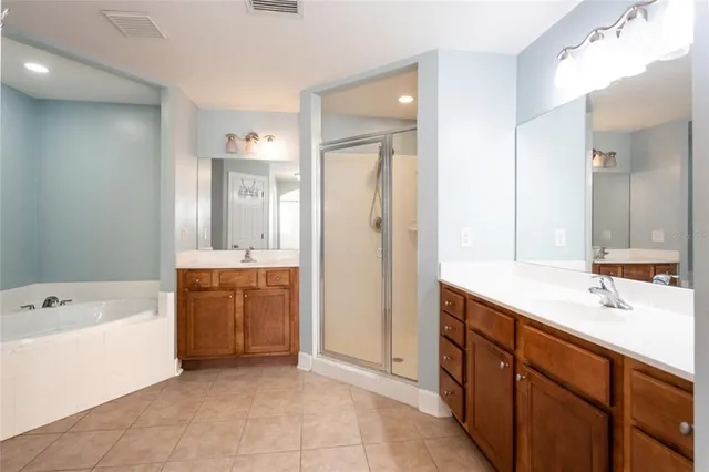 a view of kitchen with cabinets and wooden floor