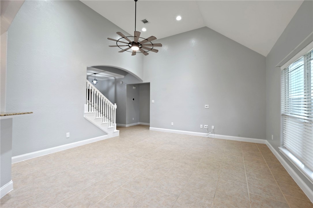 3304 Keefer Loop College Station, TX 77845 - Photo 4 of 21 an empty room with windows and fan