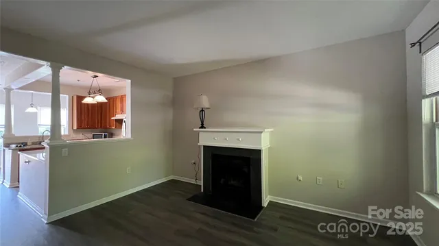 a view of a livingroom with wooden floor