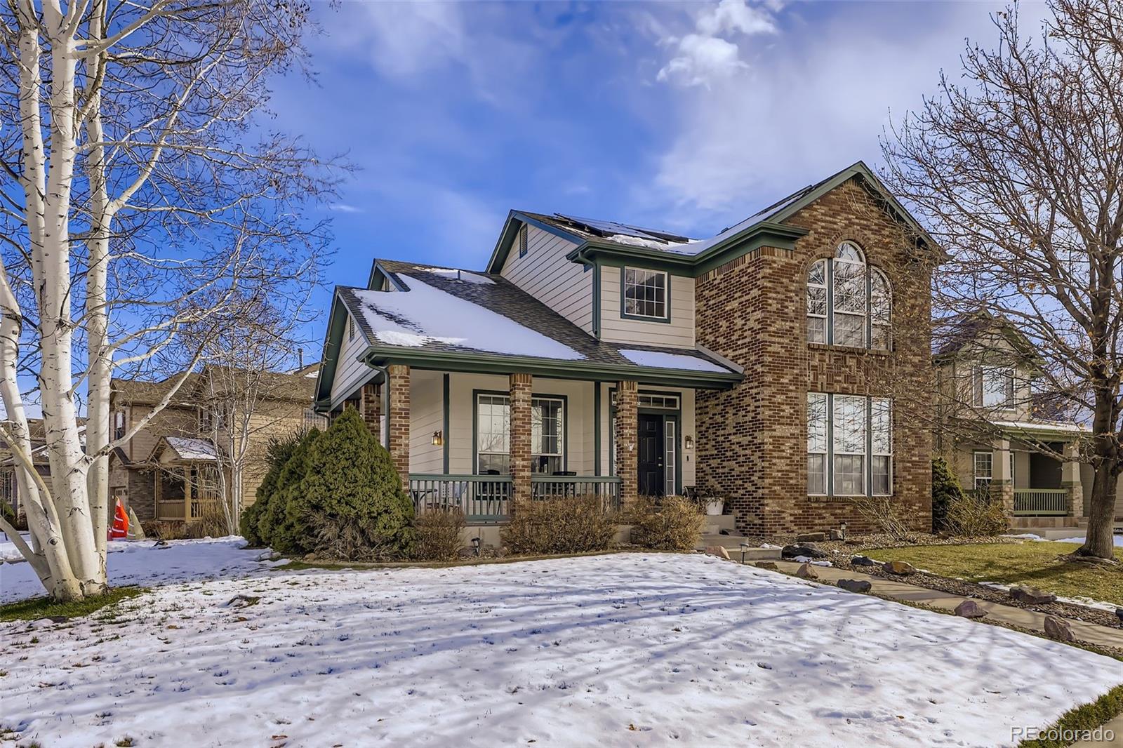 11668 Xavier Way Westminster, CO 80031 - Photo 1 of 22 a front view of a house with garden