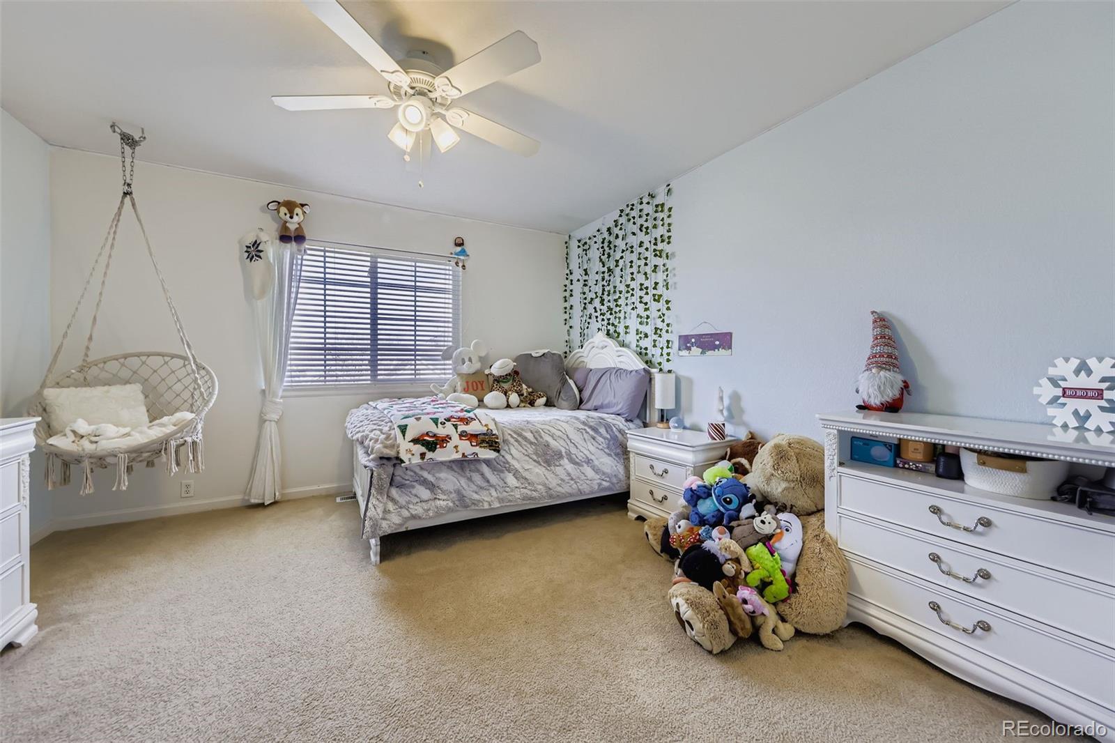 11668 Xavier Way Westminster, CO 80031 - Photo 14 of 22 a bedroom with a bed and a window