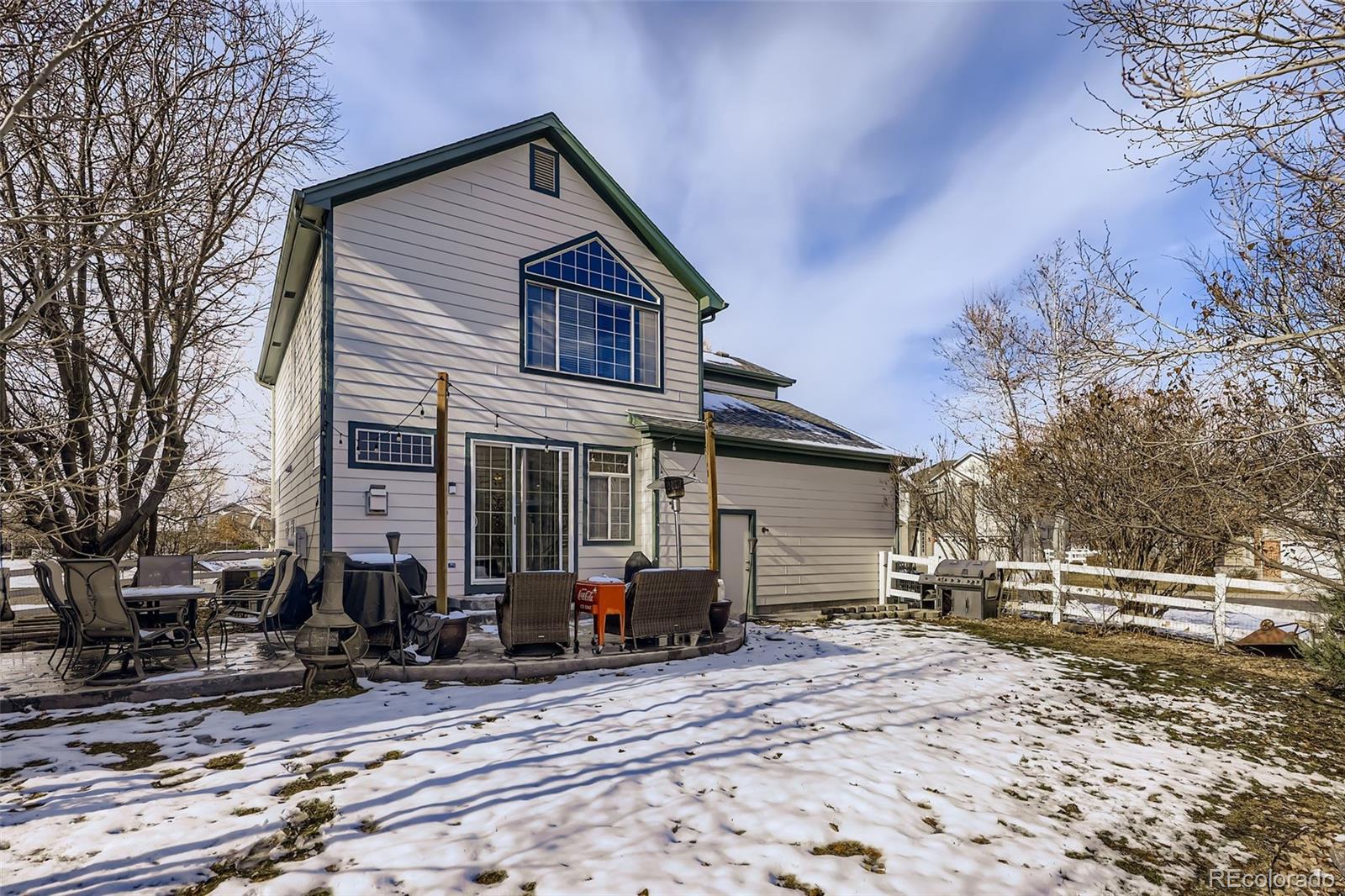 11668 Xavier Way Westminster, CO 80031 - Photo 21 of 22 a view of a house with wooden fence