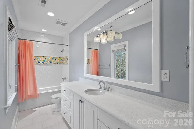 a view of an empty room with a balcony