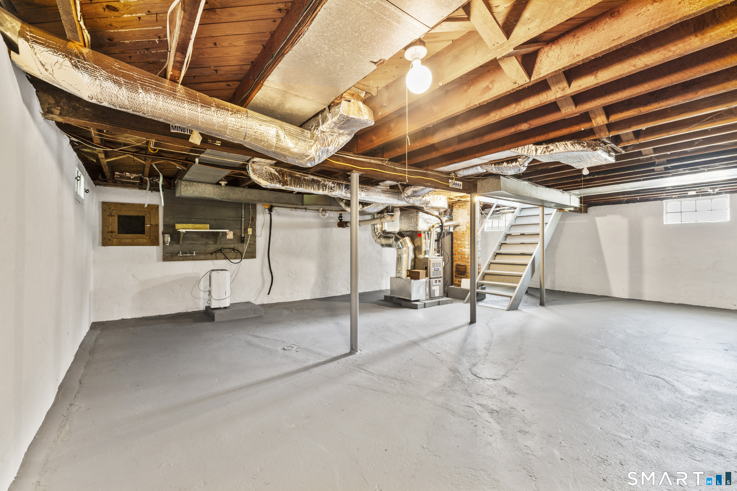 110 Minturn Road Bridgeport, CT 06606 - Photo 24 of 29 a view of under construction room and wooden walls