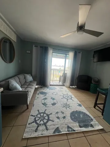 a kitchen with a dining table and chairs