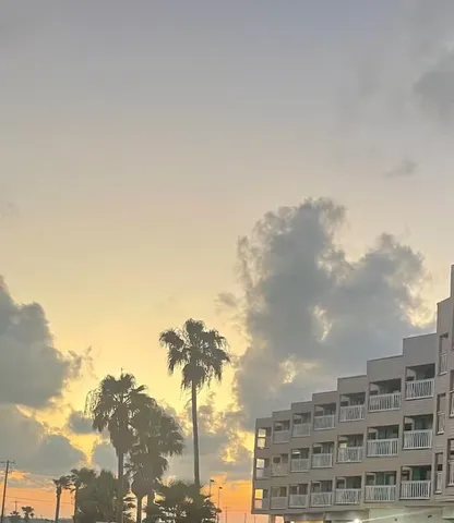 a view of a entryway door with wooden floor