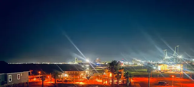 a view of a water fountain and a yard