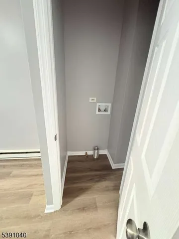 a view of staircase with white walls