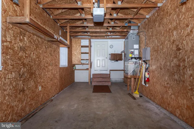 a house with trees in the background