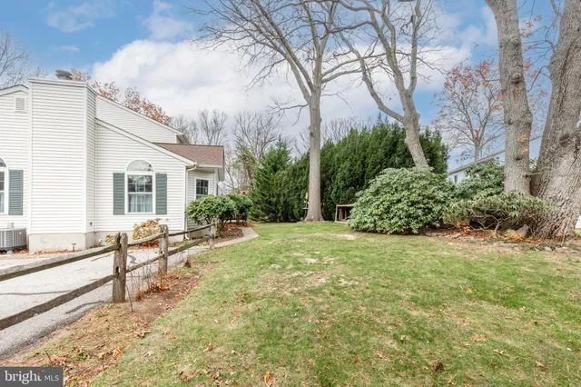 a kitchen with a sink cabinets and appliances