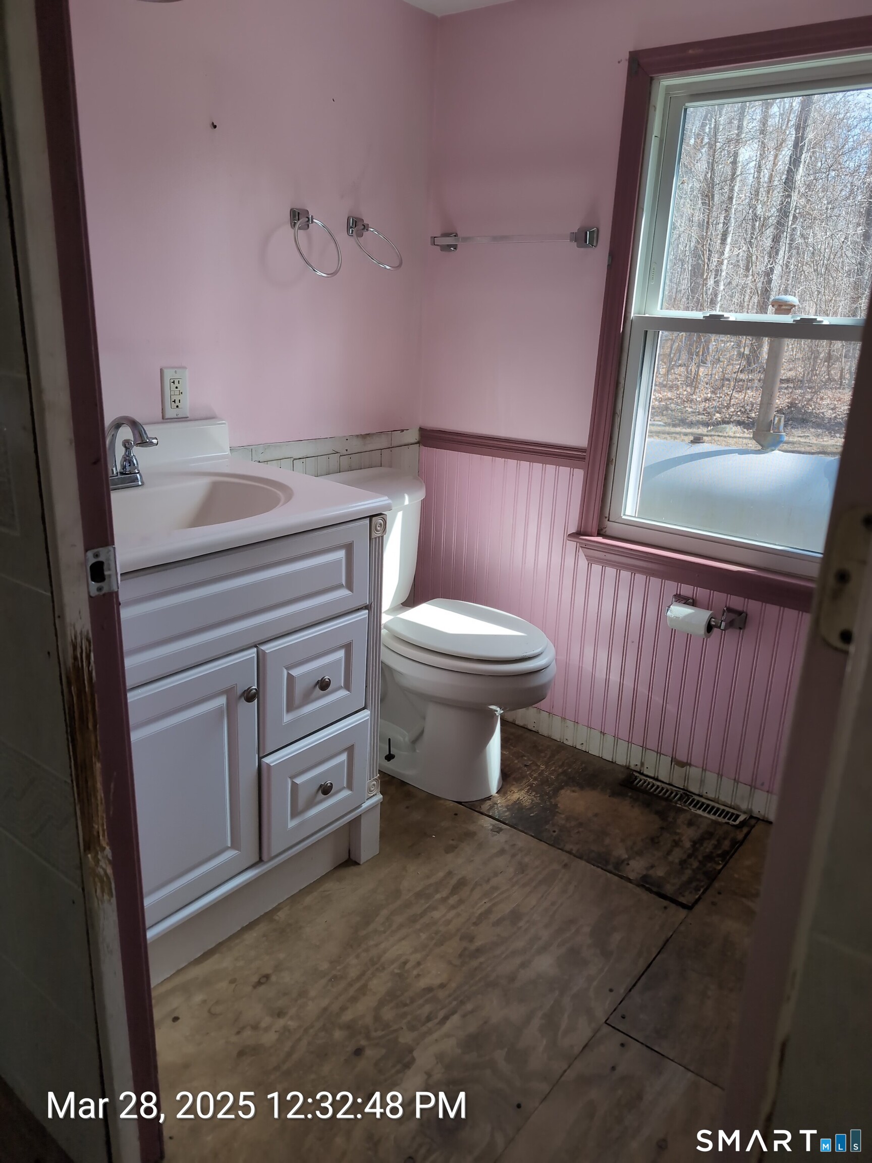97 Bushy Hill Road Deep River, CT 06417 - Photo 17 of 28 a bathroom with a toilet a sink and a window