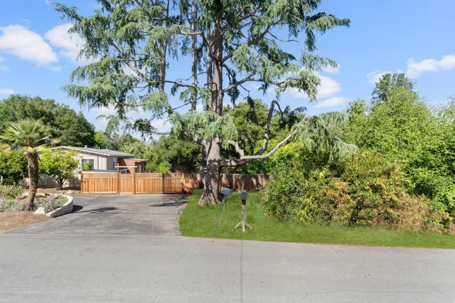 front view of a house with a garden