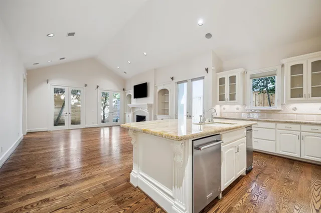 a utility room with sink dryer and washer