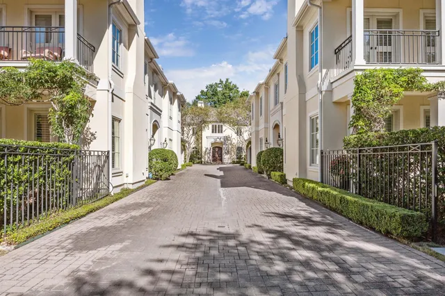 a view of a street in front of a building