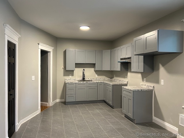 514 Winthrop Avenue New Haven, CT 06511 - Photo 4 of 17 a kitchen with stainless steel appliances granite countertop a sink and a stove